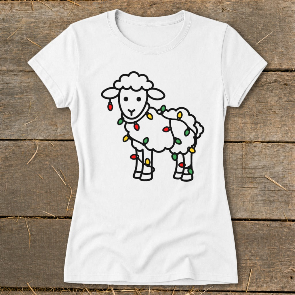 White crew neck t-shirt featuring a black-outlined sheep tangled in colorful Christmas lights.