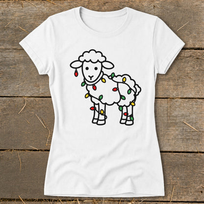 White crew neck t-shirt featuring a black-outlined sheep tangled in colorful Christmas lights.