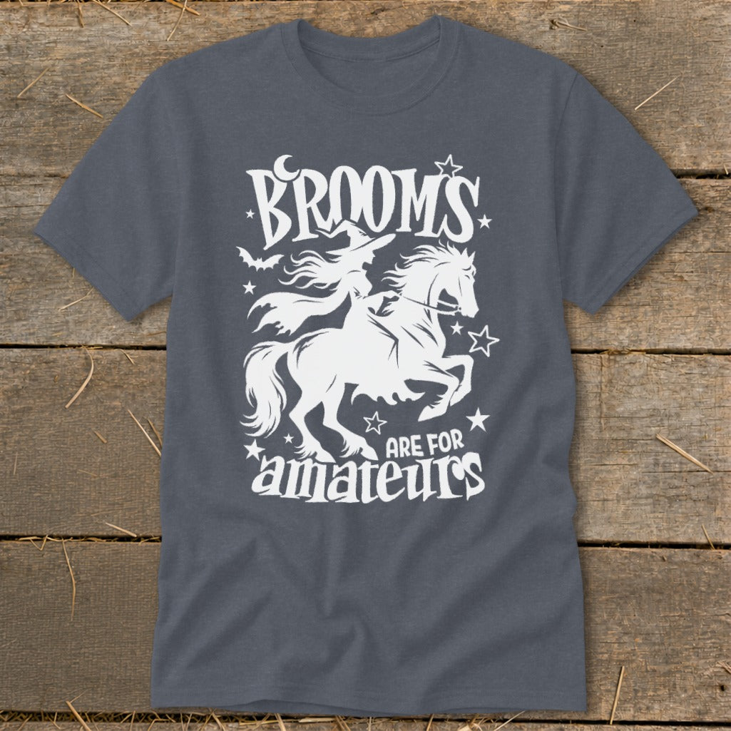 White graphic on a dark grey t-shirt with text "BROOMS ARE FOR amateurs".