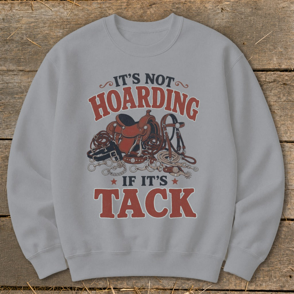 Grey sweatshirt with "It's Not Hoarding If It's Tack" and horse tack graphics.