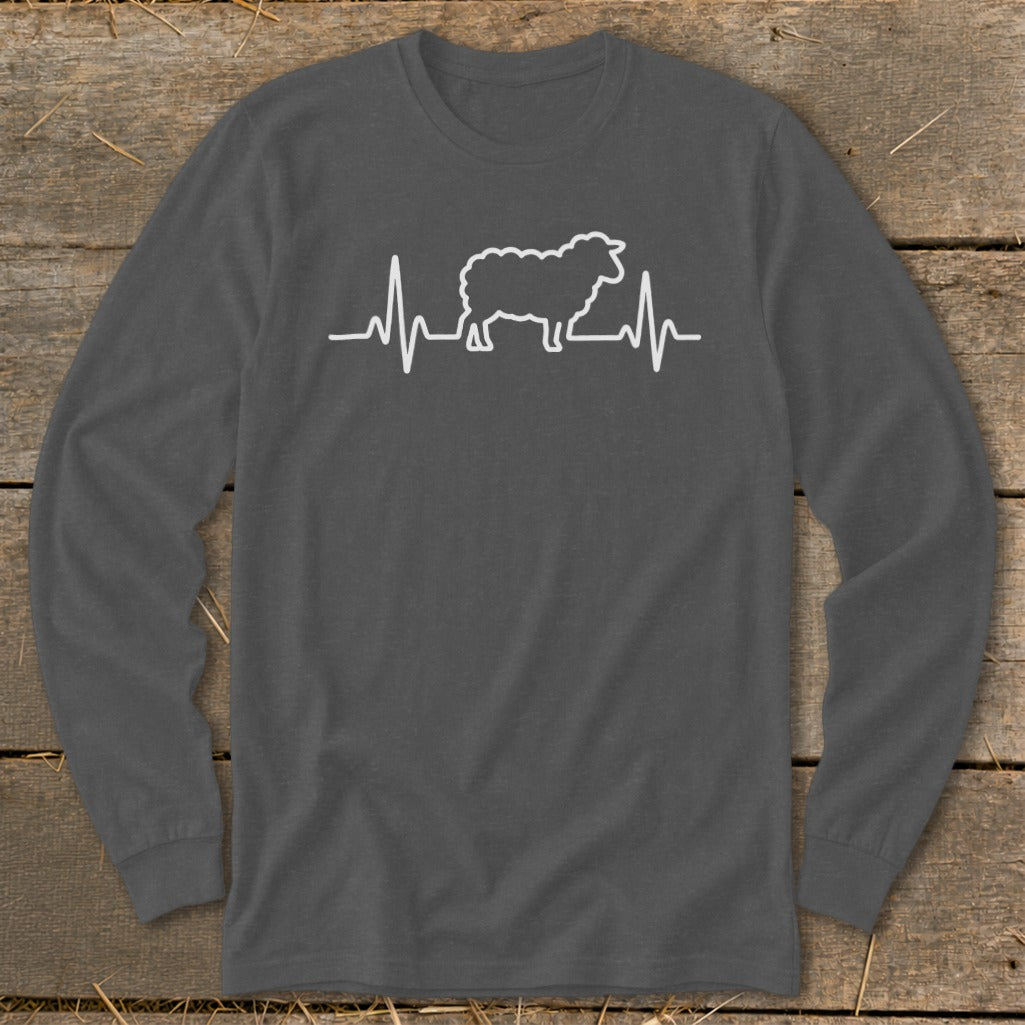 A dark gray long-sleeve crewneck shirt features a white graphic of a sheep integrated into a heartbeat line.