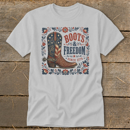 Cowboy boot with American flag design and "Boots & Freedom Since 1776" text.