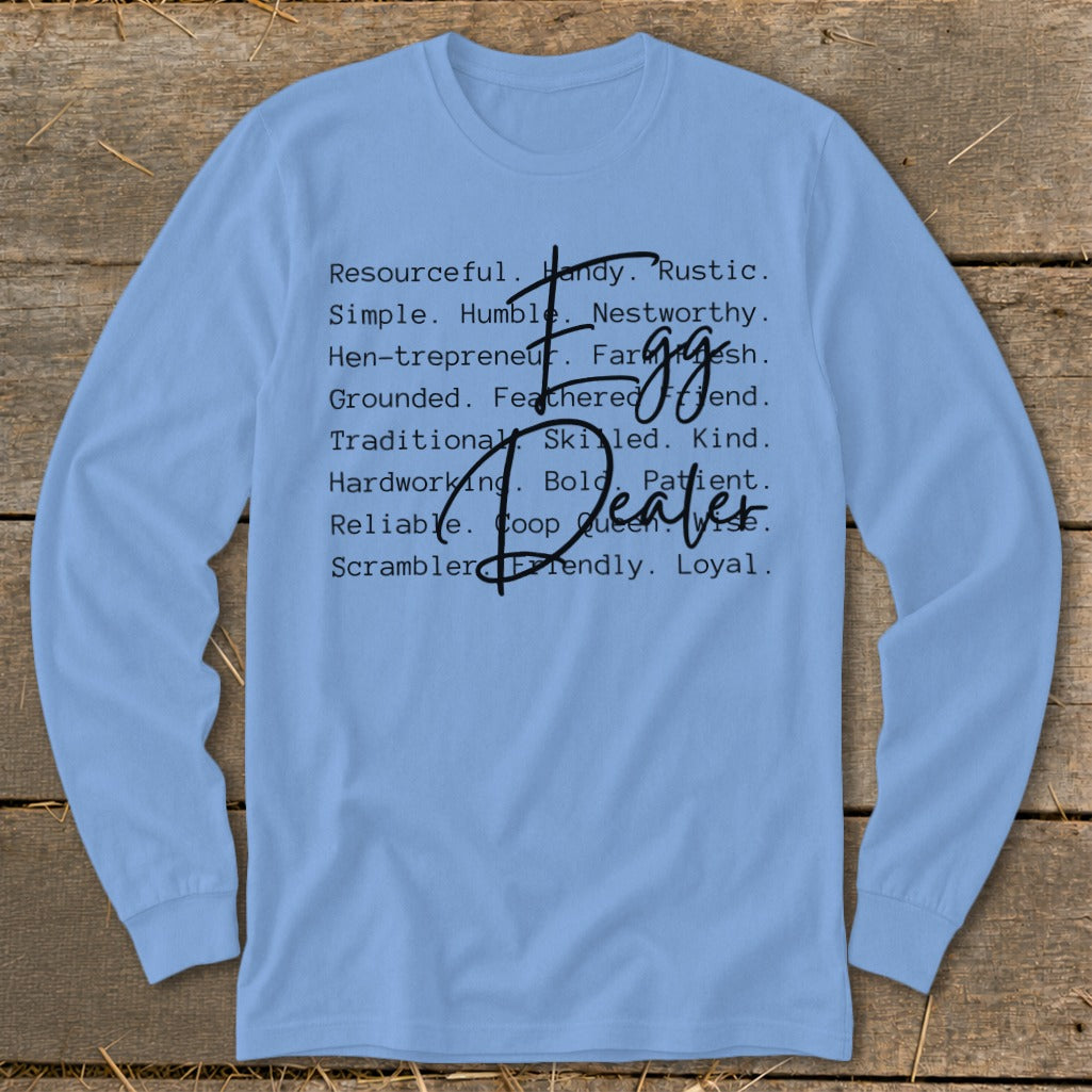 Light blue long-sleeve shirt with "Egg Dealer" text in cursive and descriptive words.