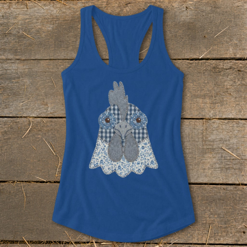 Blue tank top featuring a fabric applique of a chicken's head with a checkered pattern.