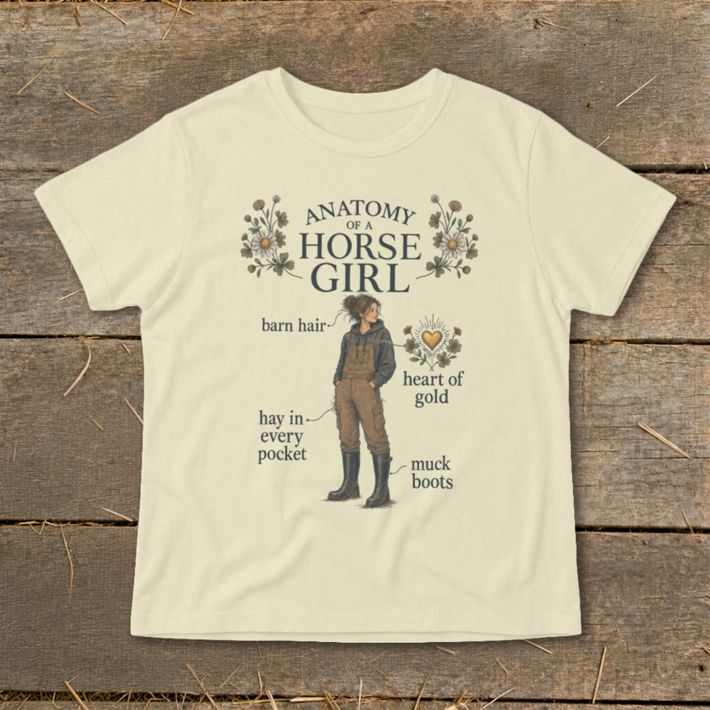 "Anatomy of a Horse Girl" graphic tee with illustrated girl, barn hair, hay, and muck boots.