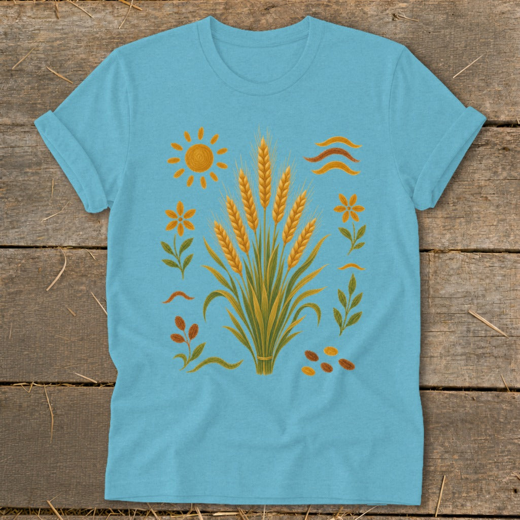 Light blue t-shirt with a central wheat stalk design and surrounding nature elements.