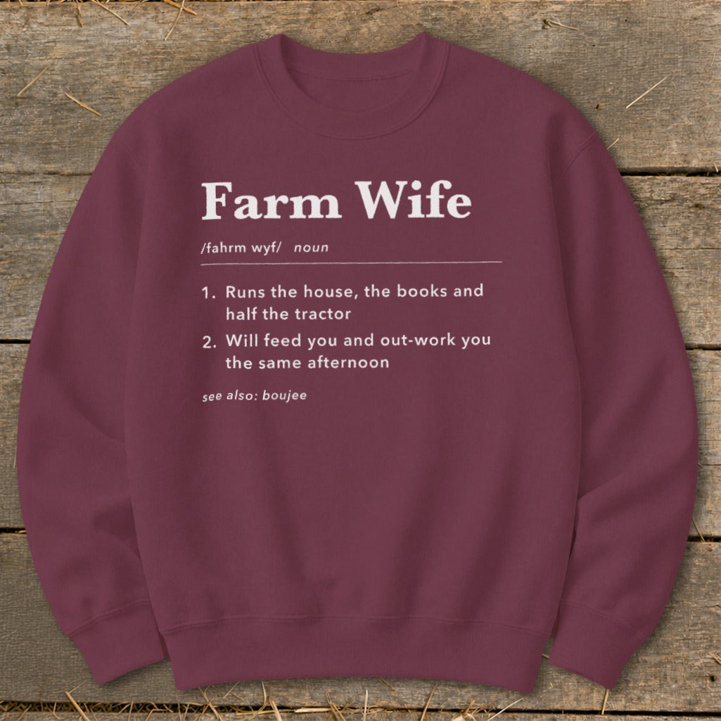 Maroon sweatshirt with "Farm Wife" definition listing responsibilities and see also: boujee.