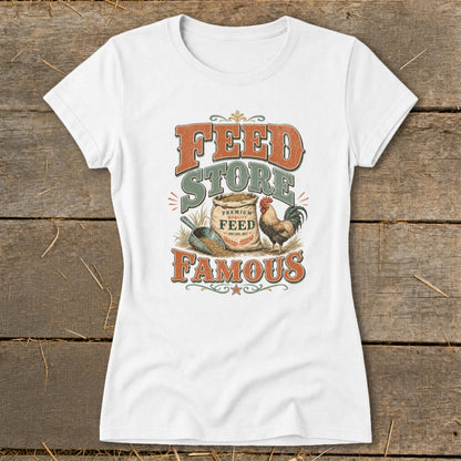 White t-shirt with "Feed Store Famous" graphic, bag of feed, scoop, and rooster.