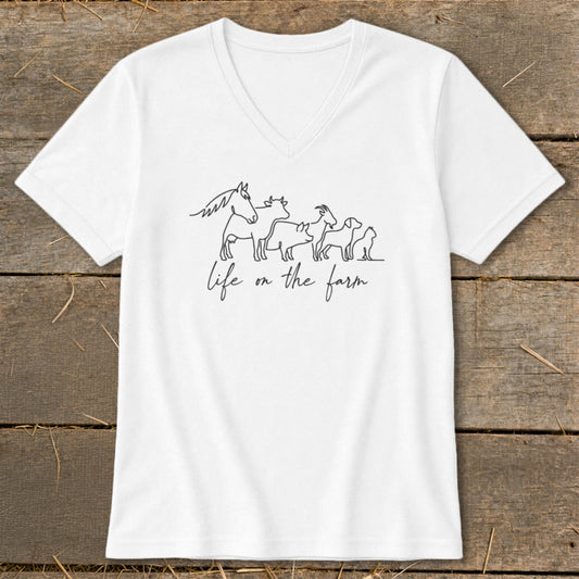 White t-shirt with line drawing of farm animals and text "life on the farm."
