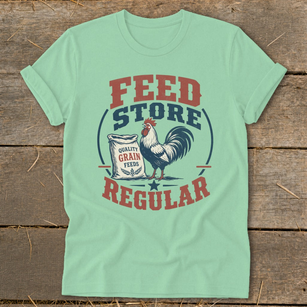 Light green t-shirt with "FEED STORE REGULAR" text, a rooster, and a bag of grain.