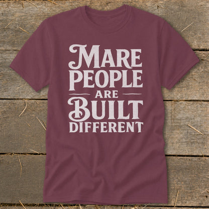 Maroon t-shirt with white text reading "Mare People Are Built Different".