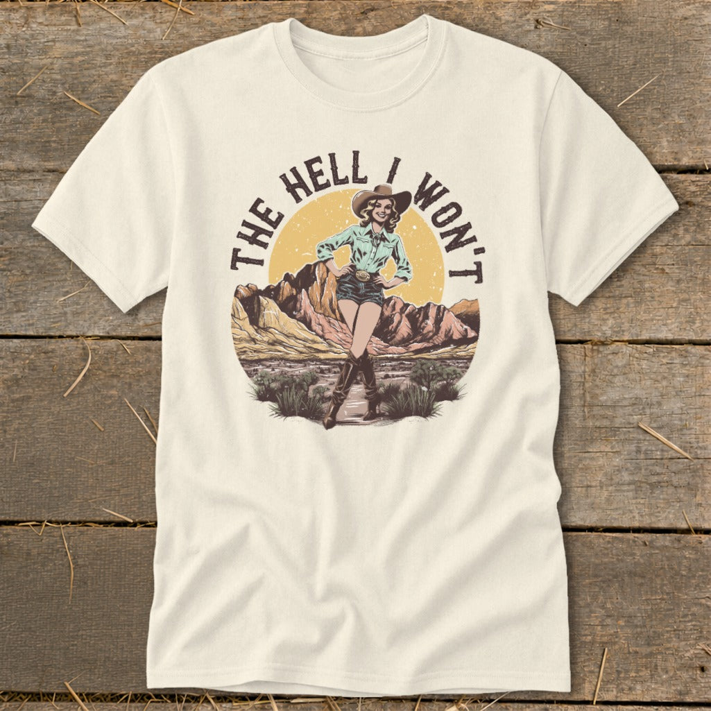 Cream t-shirt with cowgirl graphic and text "The Hell I Won't".