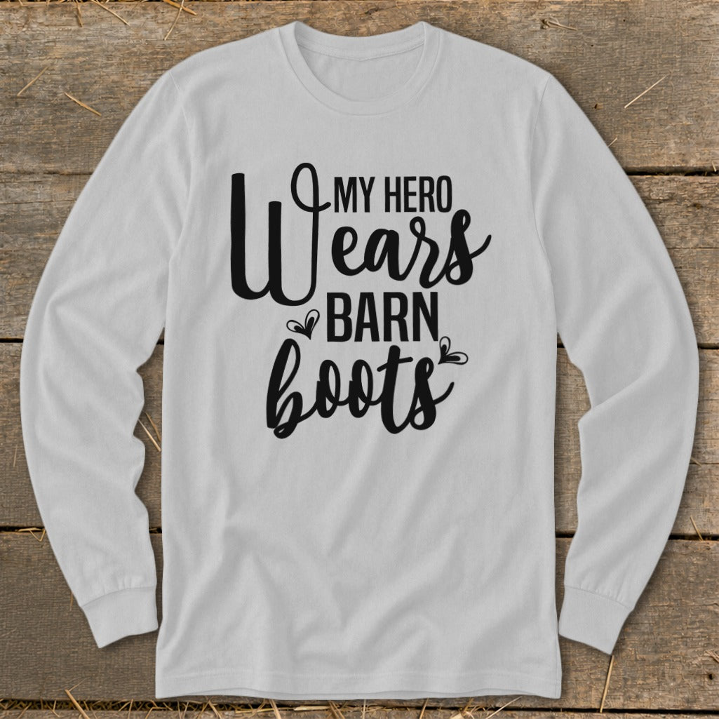 White long sleeve shirt with black text: "My Hero Wears Barn Boots".