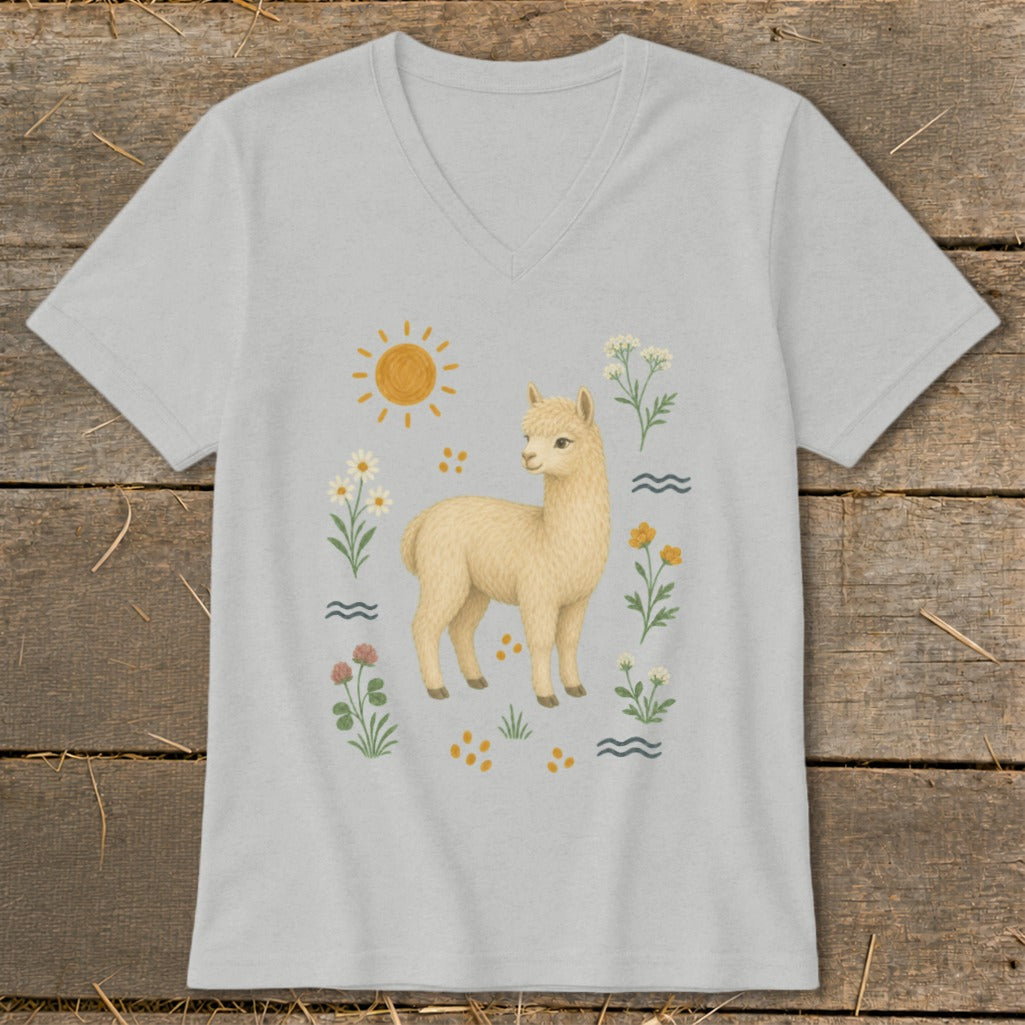 Light grey v-neck t-shirt with a light brown alpaca surrounded by flowers and sun.