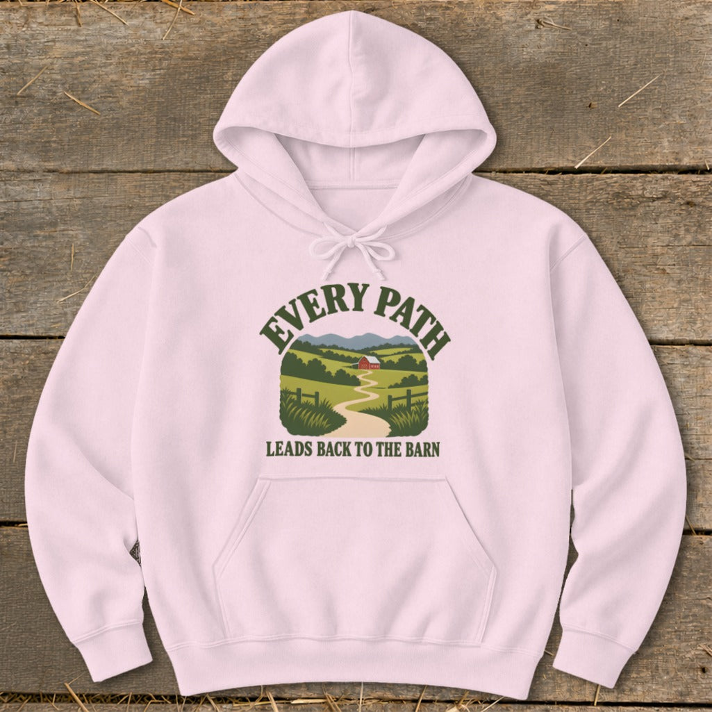 Pink hoodie with "EVERY PATH LEADS BACK TO THE BARN" text and rural landscape graphic.