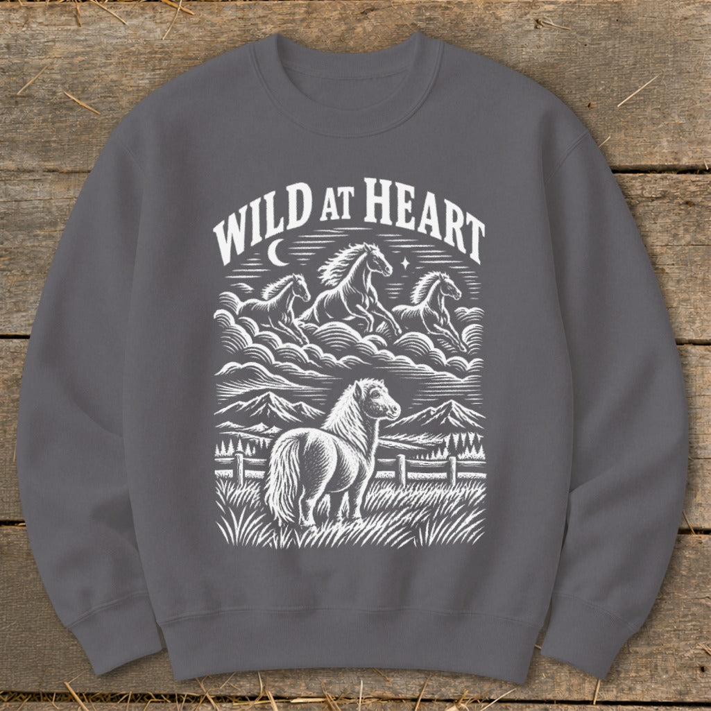Dark grey sweatshirt with "Wild at Heart" text and horse illustration.