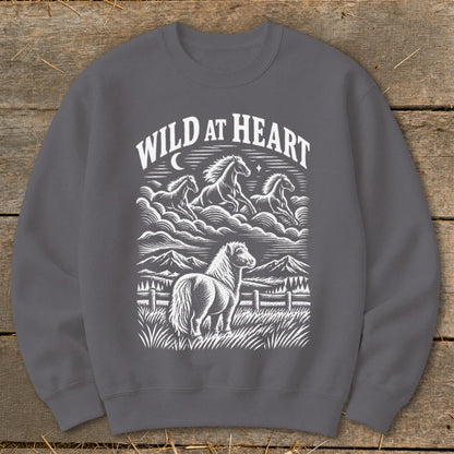 Dark grey sweatshirt with "Wild at Heart" text and horse illustration.