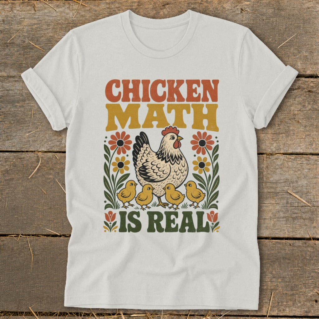 Chicken Math is Real text with hen and chicks illustration on white t-shirt.
