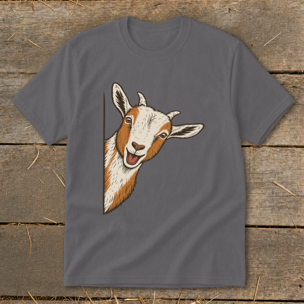 T-shirt with a happy, peeking goat illustration on gray fabric.