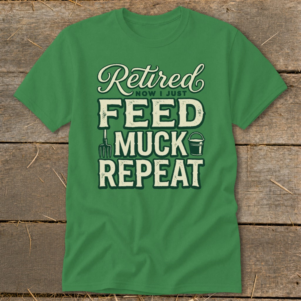 Green t-shirt with text "Retired NOW I JUST FEED MUCK REPEAT" and farm graphics.