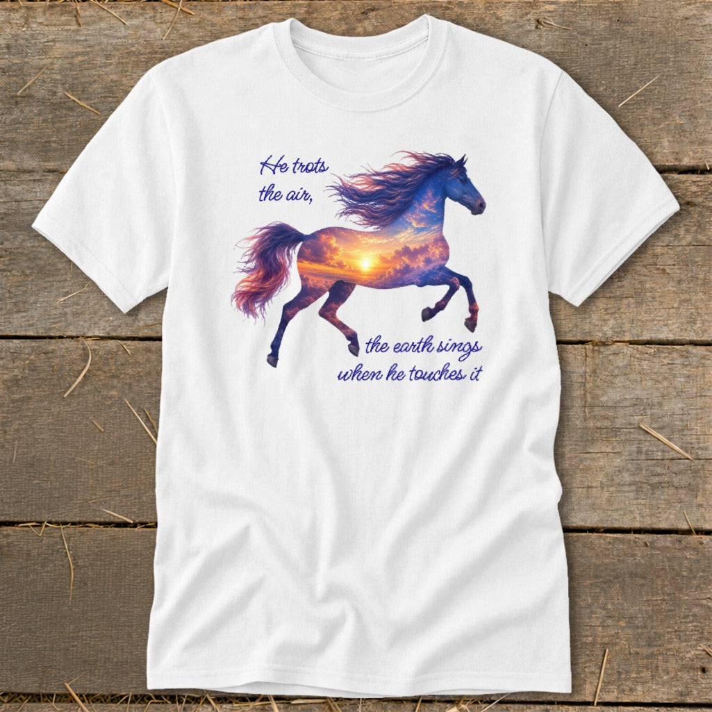 A white t-shirt featuring a running horse graphic filled with a sunset sky and inspirational text.