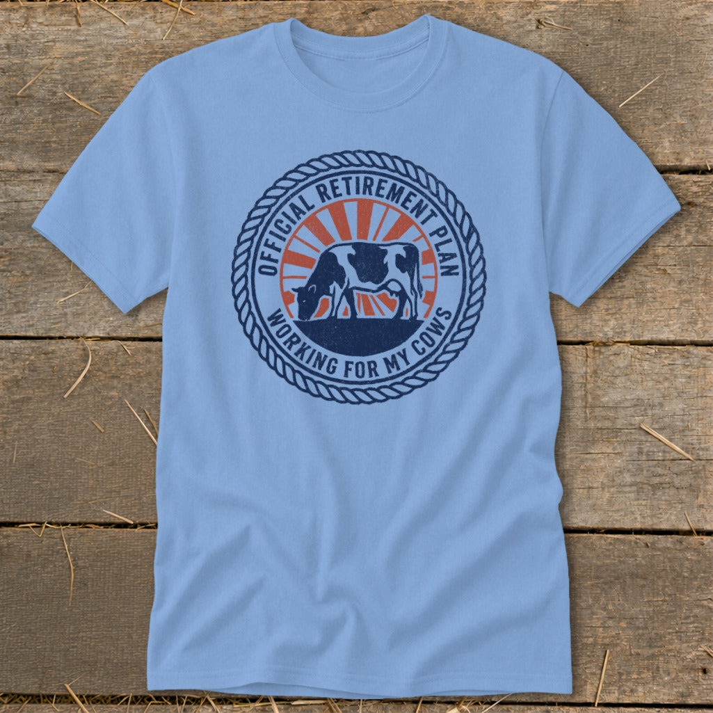 Light blue t-shirt with "Official Retirement Plan Working For My Cows" graphic.