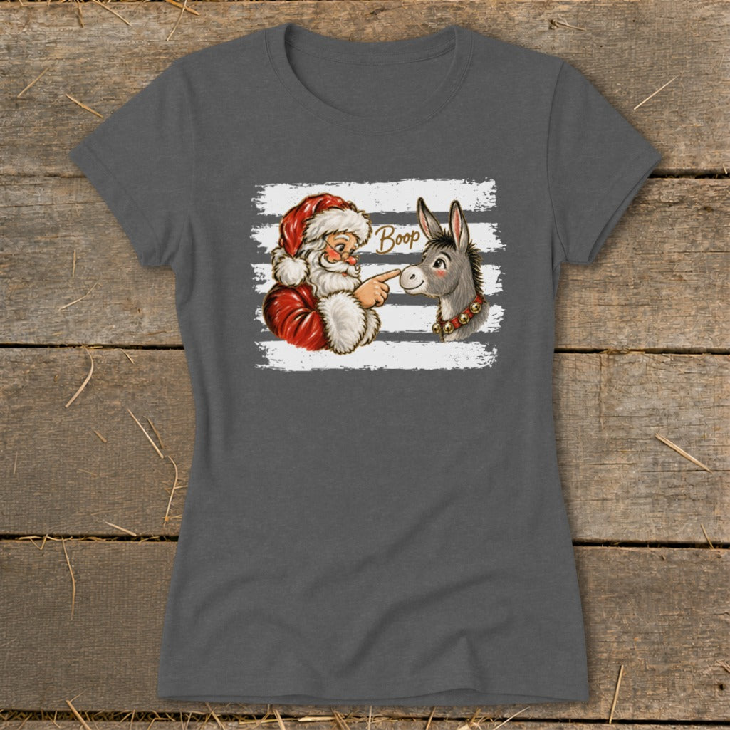 Santa boops a donkey's nose with the word "Boop" written above.