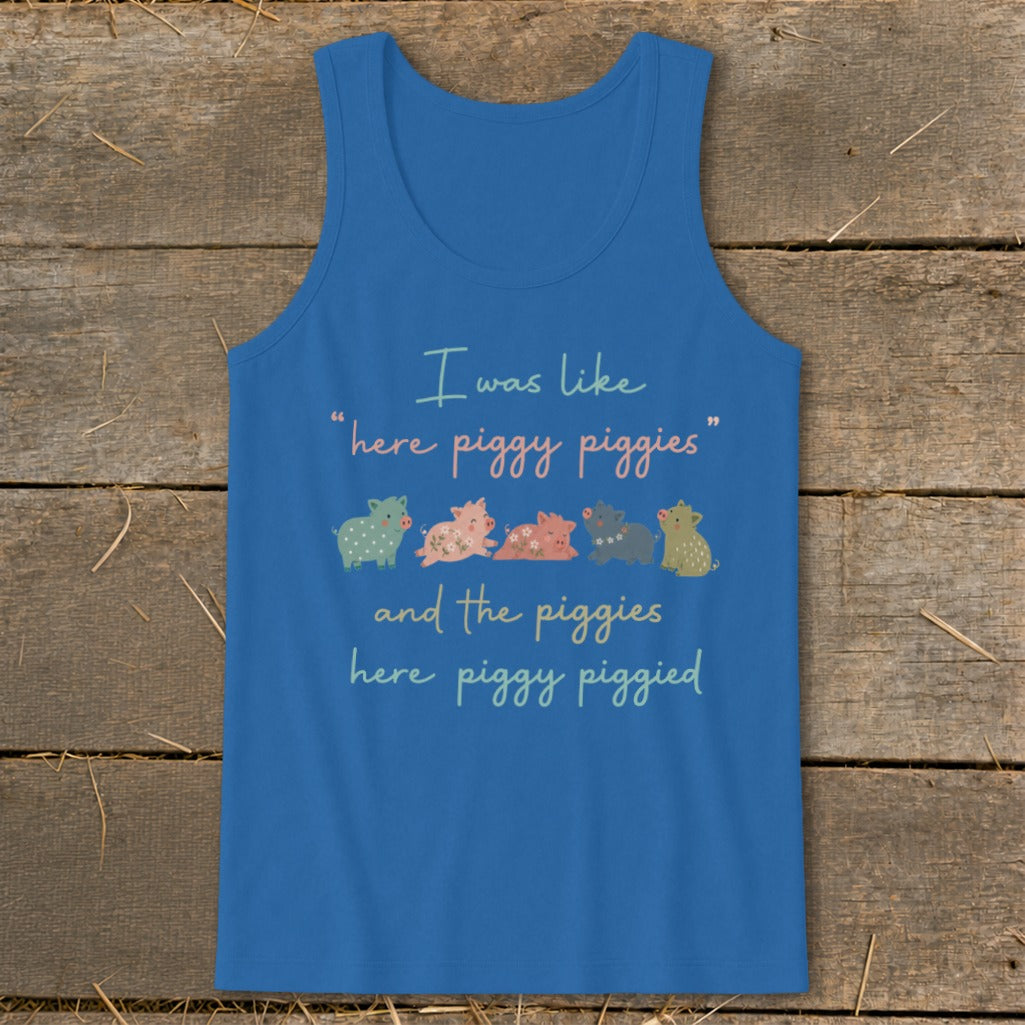 Blue tank top with cartoon pigs and text "I was like 'here piggy piggies' and the piggies here piggy piggied."