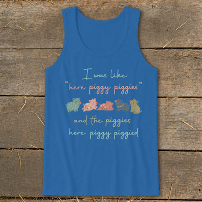 Blue tank top with cartoon pigs and text "I was like 'here piggy piggies' and the piggies here piggy piggied."