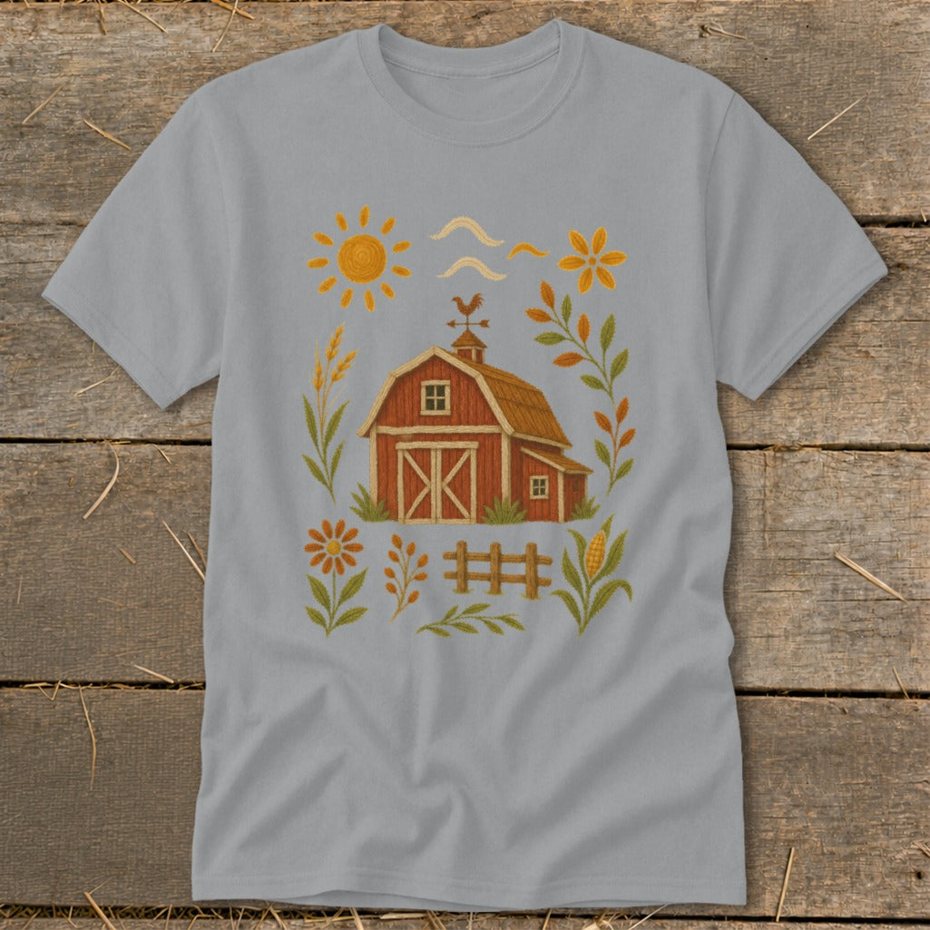 Gray t-shirt with a red barn, sun, flowers, fence, and corn illustration.
