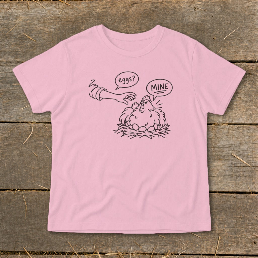 Pink t-shirt with a black line drawing of a chicken guarding eggs, a hand asks "eggs?", the chicken replies "MINE".