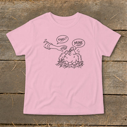 Pink t-shirt with a black line drawing of a chicken guarding eggs, a hand asks "eggs?", the chicken replies "MINE".