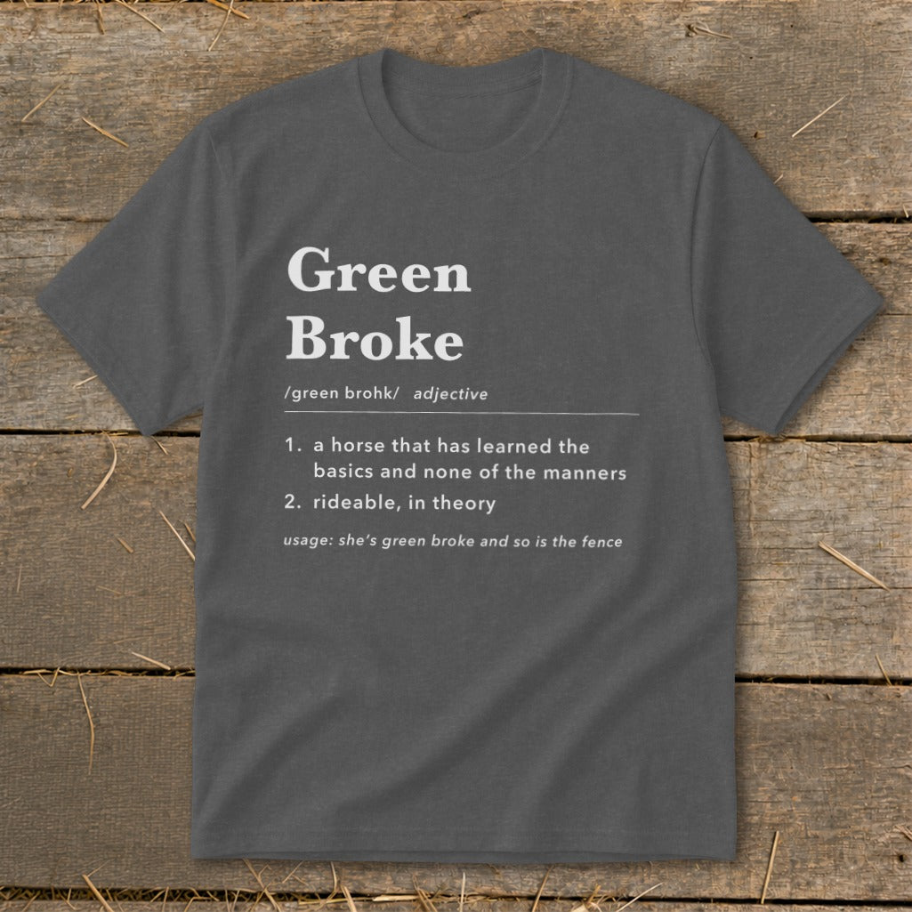 A dark gray crewneck t-shirt with a humorous dictionary definition of green broke printed on the chest.