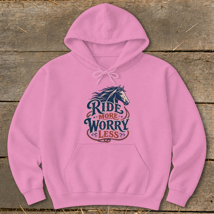 Pink hoodie with horse graphic and text "Ride More Worry Less".