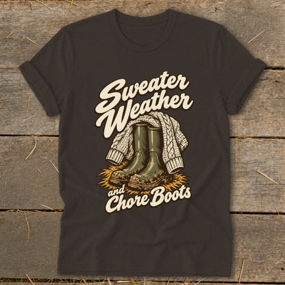 T-shirt graphic with text "Sweater Weather and Chore Boots" over boots and sweater.