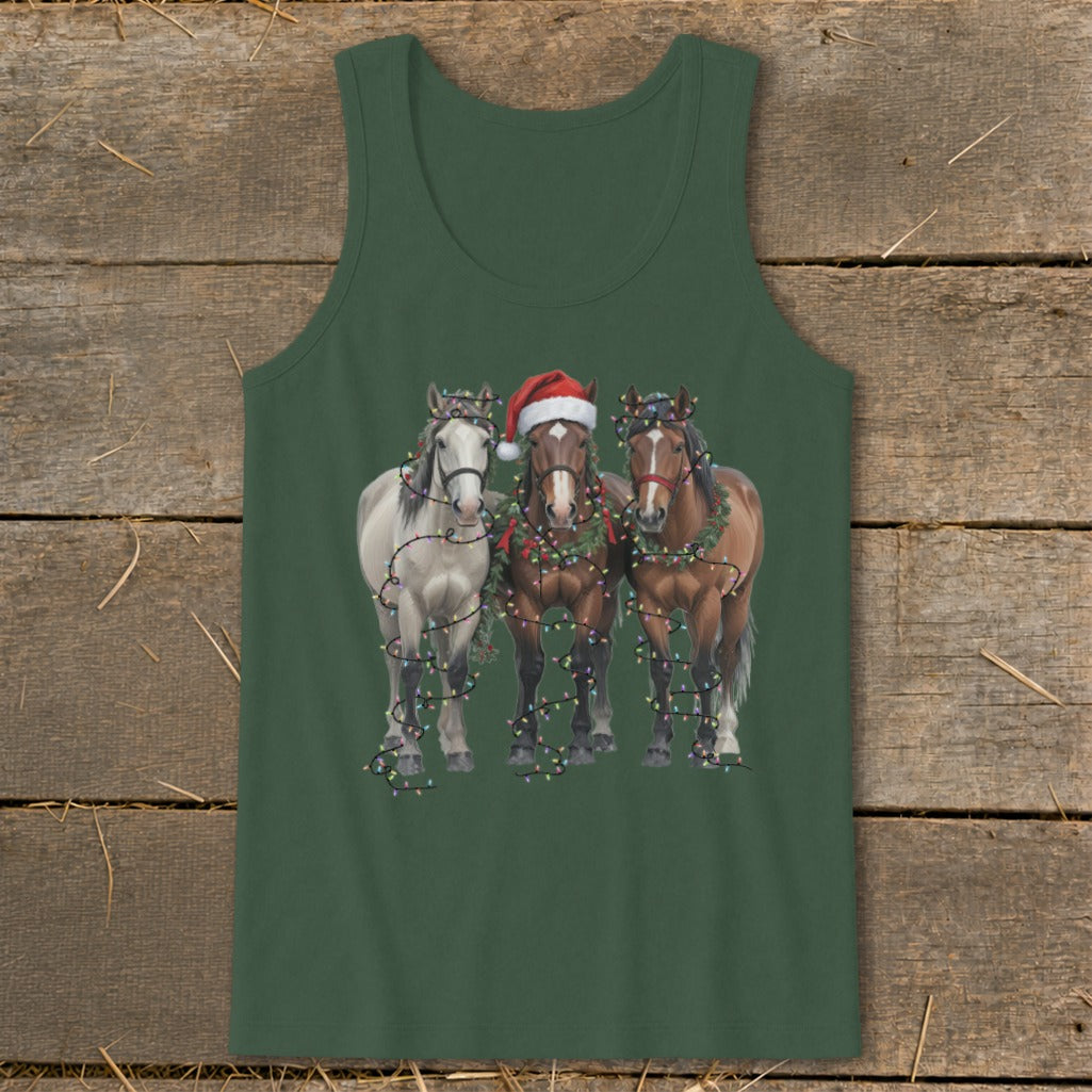 Three horses wear Santa hats and Christmas lights on a dark green tank top.