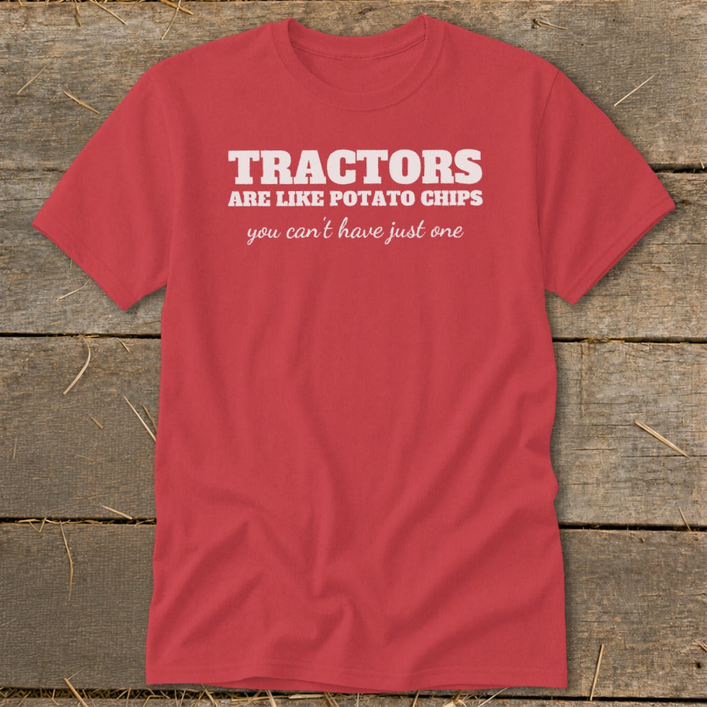 Red t-shirt with white text that reads "TRACTORS ARE LIKE POTATO CHIPS you can't have just one".