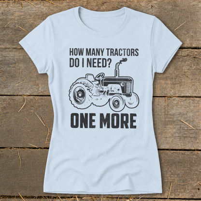 Light blue t-shirt with black graphic: "How Many Tractors Do I Need? One More" and a tractor.