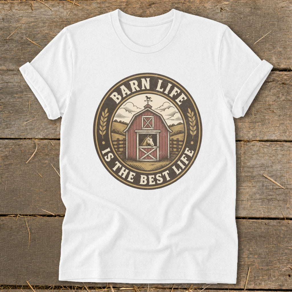 White t-shirt with circular graphic featuring a red barn, horse, and text "Barn Life Is The Best Life".