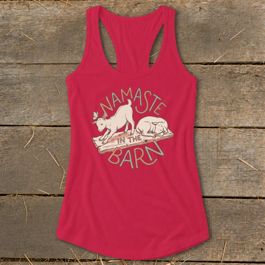 Pink tank top with "Namaste in the Barn" graphic featuring goats.