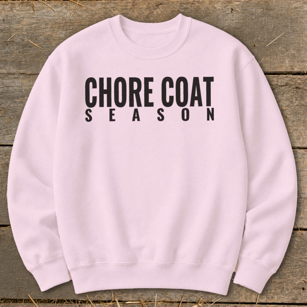 Light pink sweatshirt with black text reading "CHORE COAT SEASON".