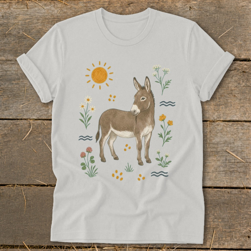 Light gray t-shirt with a brown donkey illustration surrounded by flowers and sun.