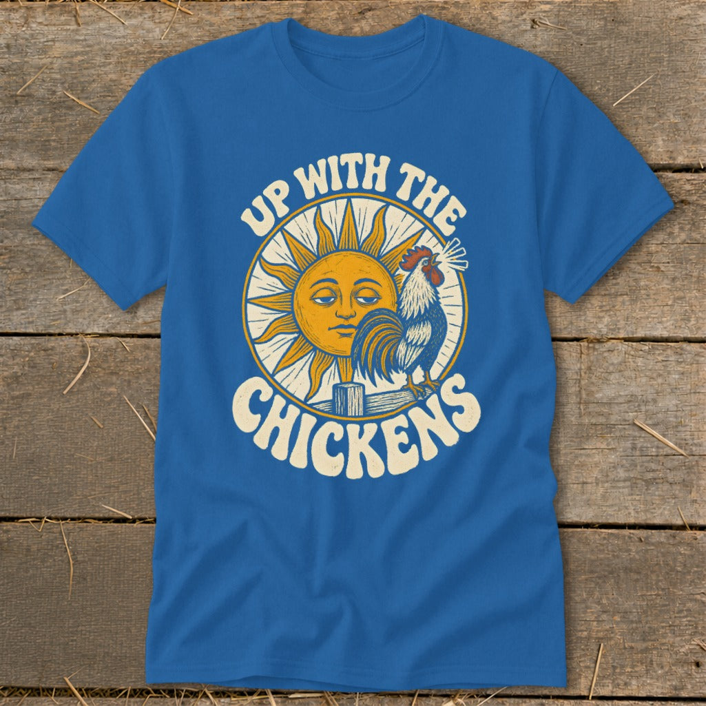Royal blue t-shirt featuring a retro sun graphic with a crowing rooster and the text Up With The Chickens.