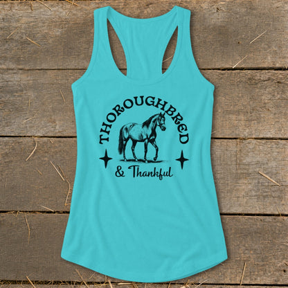 Teal racerback tank with black horse graphic and text: Thoroughbred & Thankful.