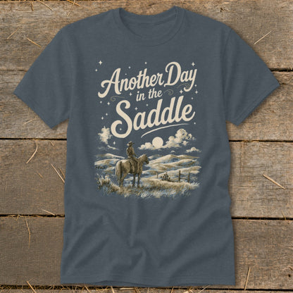 T-shirt with cowboy on horse and text "Another Day in the Saddle".