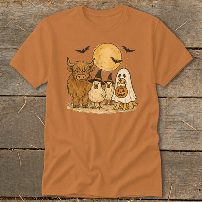 Highland cow, chickens, and dog in costumes under a full moon.