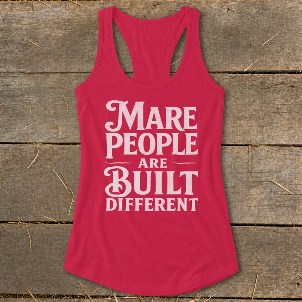 Pink racerback tank top with white text that reads "Mare People Are Built Different".