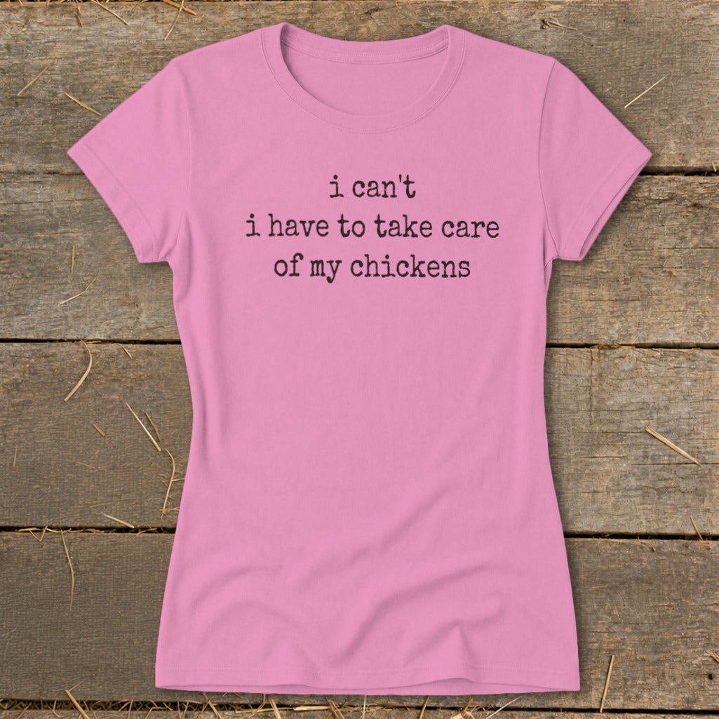 Pink t-shirt with text "i can't i have to take care of my chickens"