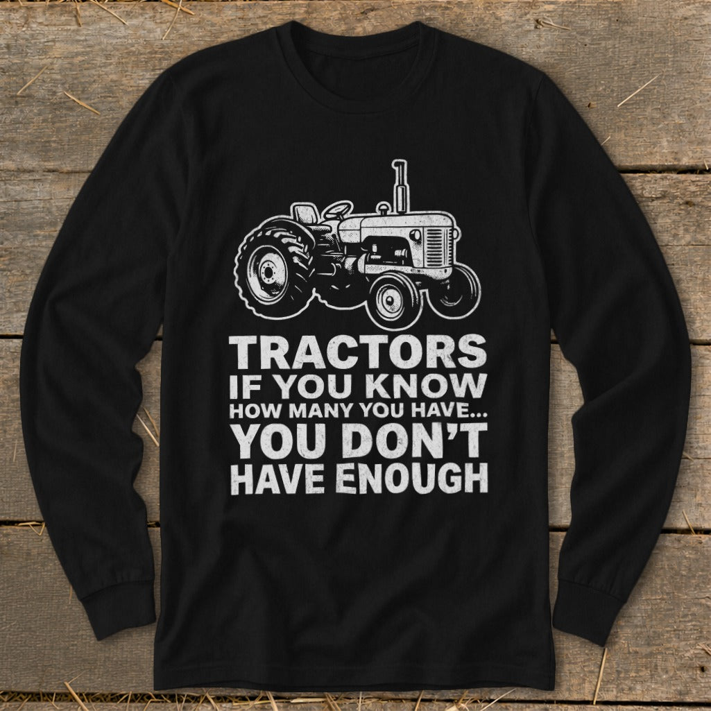 Black long sleeve shirt with white tractor graphic and "Tractors If You Know How Many You Have... You Don't Have Enough" text.