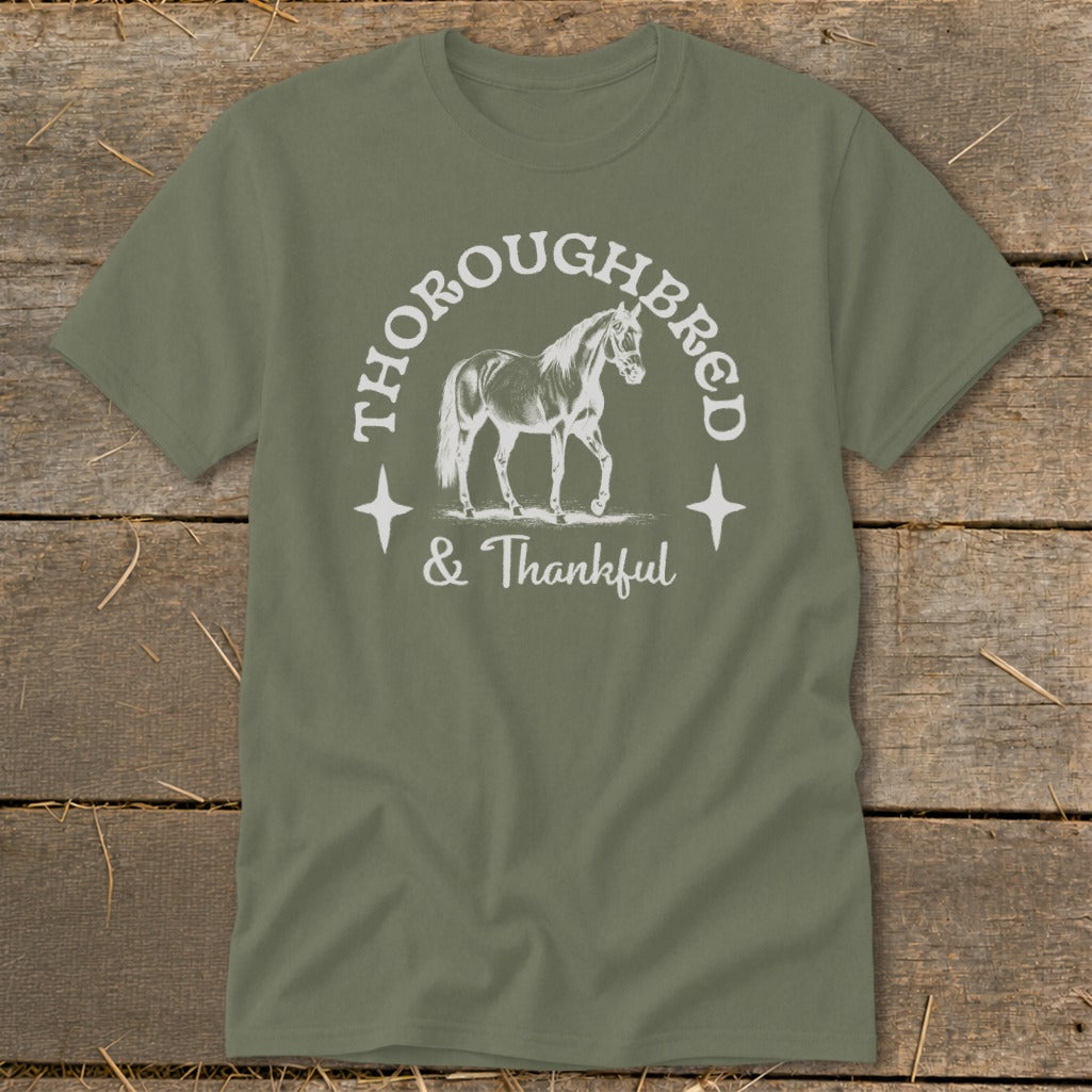 Olive green t-shirt with "Thoroughbred & Thankful" and horse graphic.